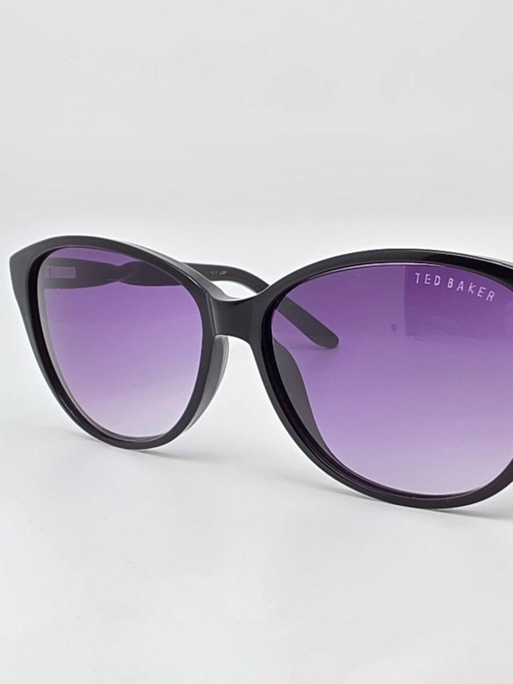 Ted Baker TB585 Black Twist Frame Purple Gradient Lens Cat Eye Sunglasses 55mm